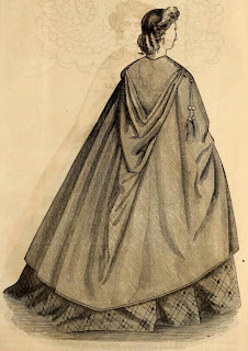 cloak with long pointy hood